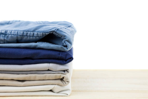 istock Pile of clothes on wood,white background. 679760654
