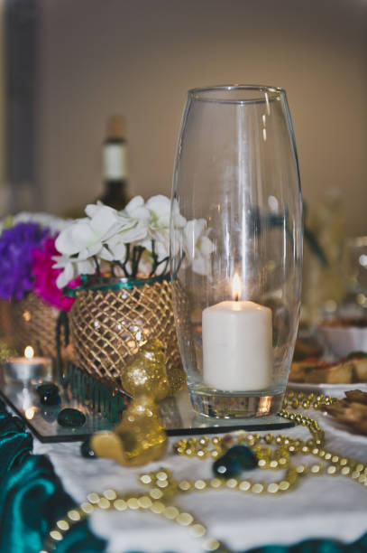 istock The table decoration with candles and flowers 5690. 679762762