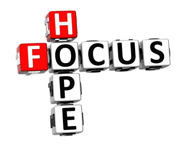 istock 3D Crossword Focus Hope on white background 679763198