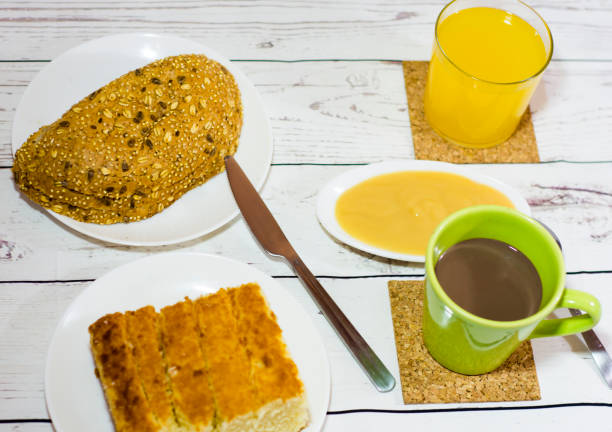 istock Healthy breakfast on a white wooden table 679764434