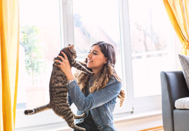 istock Happy woman portrait wit her Cat 679782258
