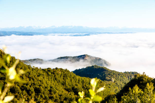istock Clouds in the mountains lit by the sun. The view from the top. 679782628