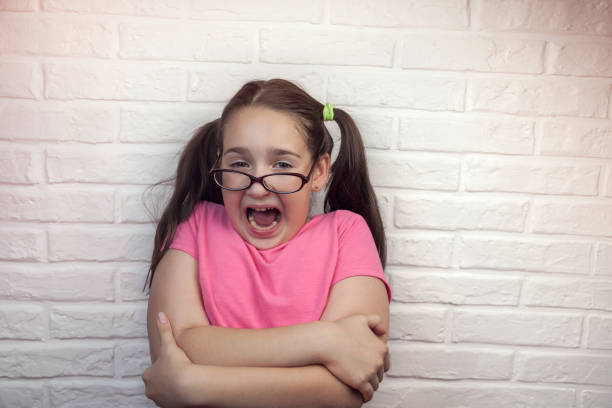 istock Young girl shows fear 679784062