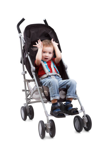 istock Child in a baby carriage on a white background 679789334