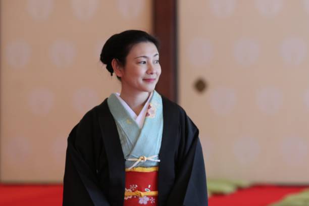 istock Lady with kimono at Japanese temple 679793780