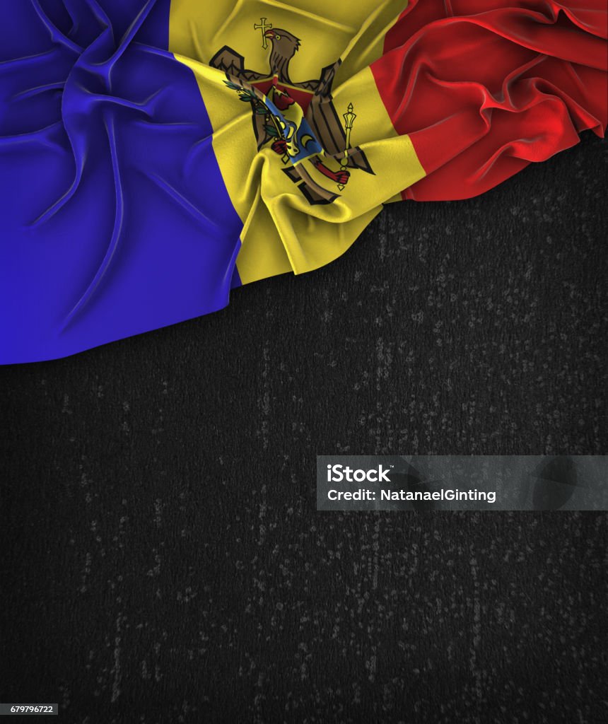 Moldova Flag Vintage on a Grunge Black Chalkboard With Space For Text Flag Stock Photo