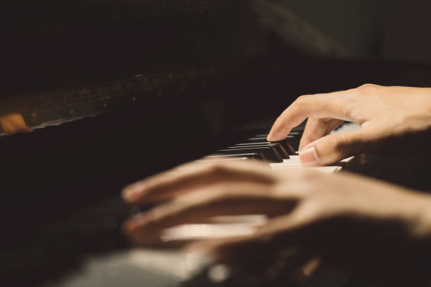 istock Playing Piano Close-up Shot 679797556