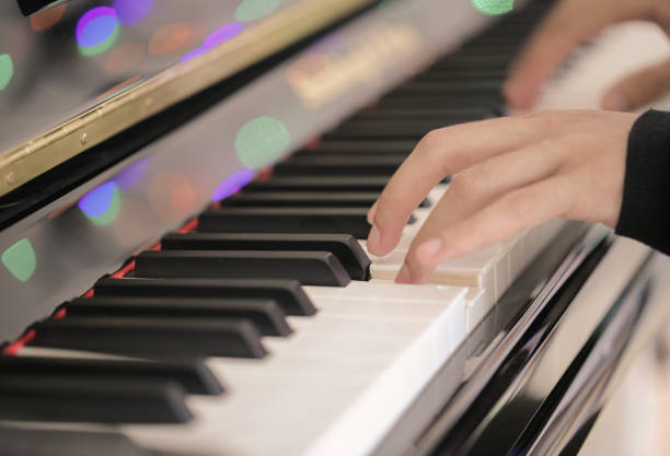 istock Playing Piano Close-up Shot 679797560