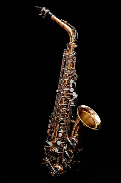 Saxophone isolated on black background stock photo