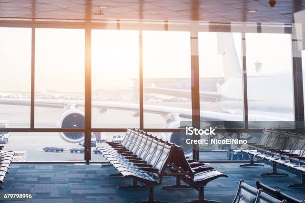 Airport Boarding Gate With Seats Windows And Aircraft Stock Photo - Download Image Now