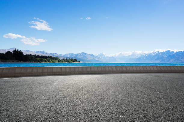 istock empty road with blue sea in blue sky 679799016
