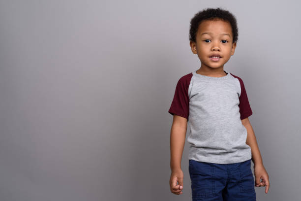 istock Studio shot of young African boy against gray background 679801672