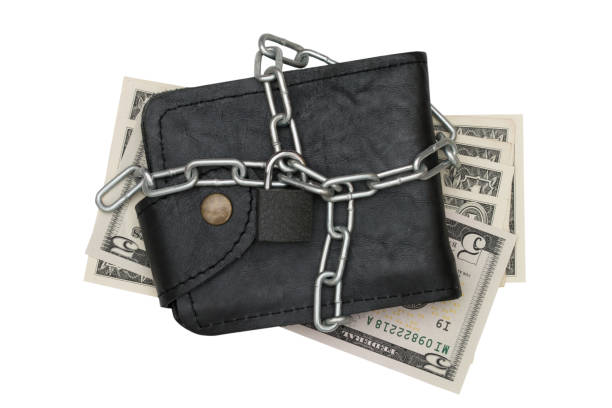 istock leather wallet with chain locker and dollar bill 679803778