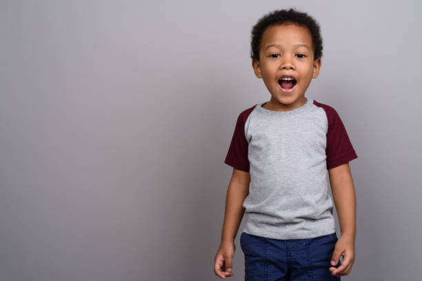 istock Studio shot of young African boy against gray background 679806362