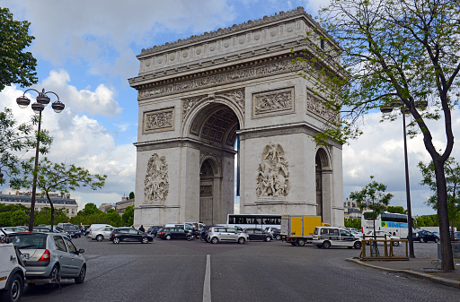 PARIS, FRANCE CIRCA MAY 2015. While French elections are dominating headlines currently, tourists still fill the City of Light and landmarks such as the Arc de Triomph remains as popular as ever.