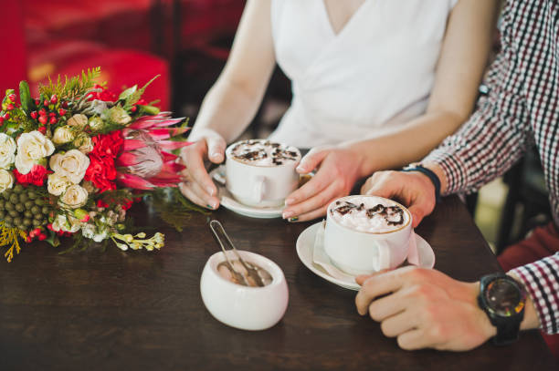 istock Hands with cups of coffee 5866. 679814174