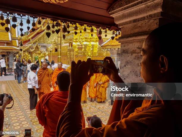 Thai Buddhist Monk Taking A Photograph With A Mobile Phone Of A Group Of Monks At Wat Doi Suthep In Chiang Mai Thailand Stock Photo - Download Image Now