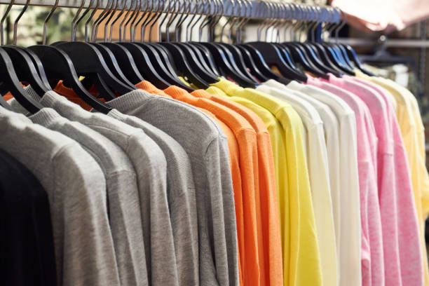 istock Clothing on hangers in store 679821332