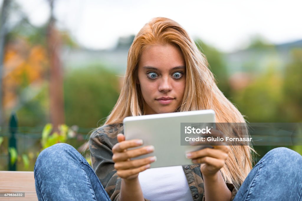Funny Faces F A Shocked Girl And A Tablet Stock Photo - Download Image Now - Embarrassment, Shock, Women - iStock Funny Faces F A Shocked Girl And A Tablet Stock Photo - Download Image Now - Embarrassment, Shock, Women - iStock
