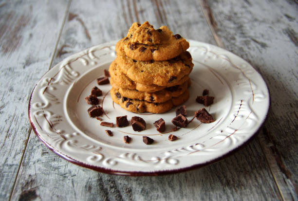 istock Chocolate chip cookies on old wooden table 679841630