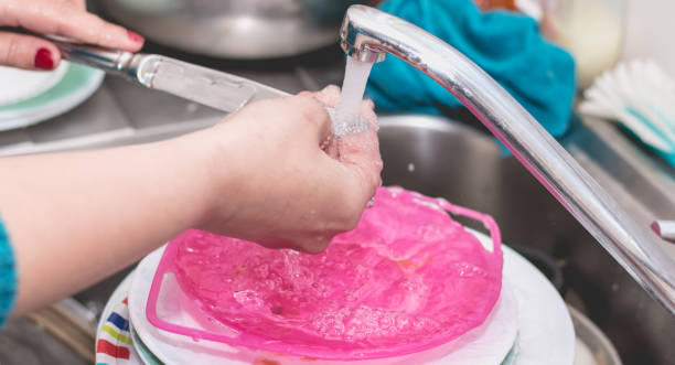istock Close up of the hand doing dishes 679849768