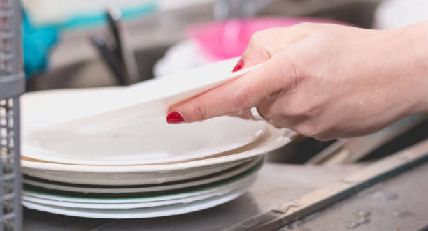 istock Close up of the hand doing dishes 679850332