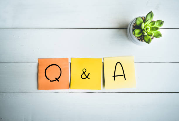 Q & A word with paper note on wood table Q & A word with paper note on white wood table backgrounds letter q stock pictures, royalty-free photos & images