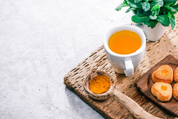 istock Herbal tea with honey and cookies 679868018
