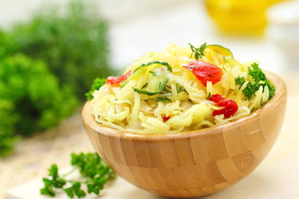 salad with pickled cabbage, cucumbers, paprika and olive oil - sauerkraut cabbage paprika salad imagens e fotografias de stock