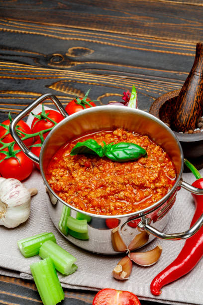 istock bolognese sauce ingridients on wooden table 679869398