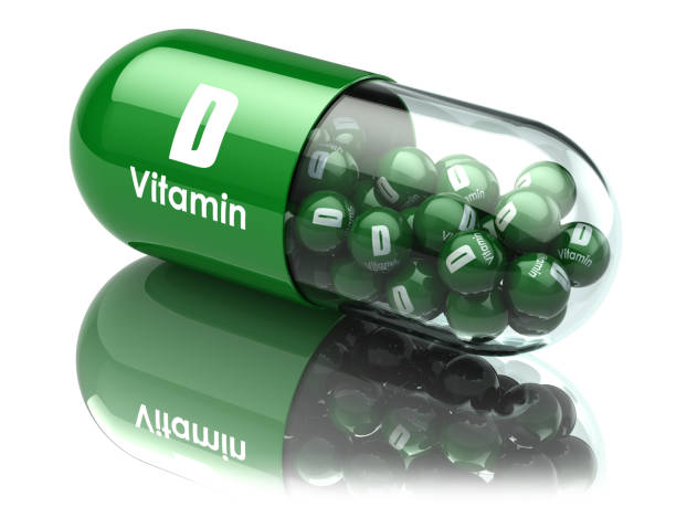 istock Vitamin D capsule or pill. Dietary supplements. 679870378