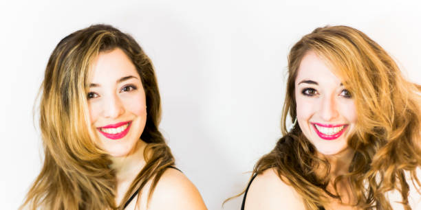 istock Two beautiful women Portrait over White Background 679879572