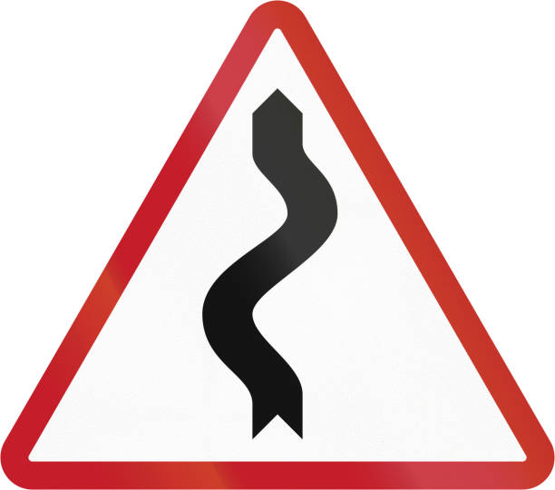 istock Road sign in the Philippines - Winding Road 679886070