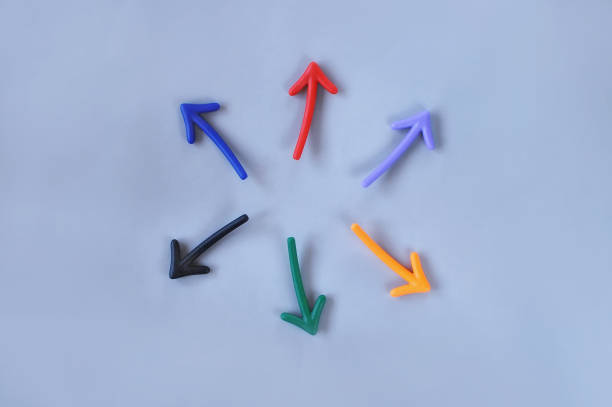 istock Top view of colorful arrow on grey background 679894914