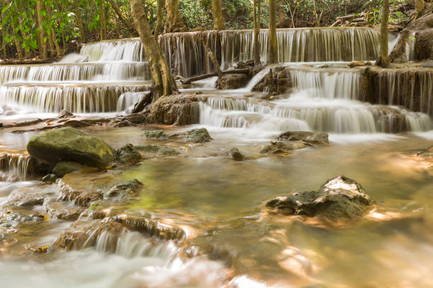 istock Beauty natural deep forest waterfall in national park 679895488