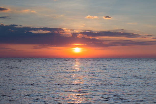 istock Sunset sky over seascape coastline 679895548