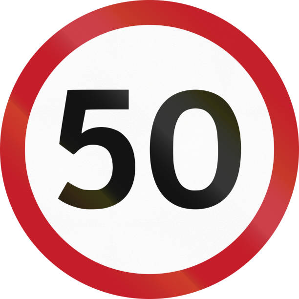 istock Road sign in the Philippines - 50 kph speed limit sign in the Philippines 679904528