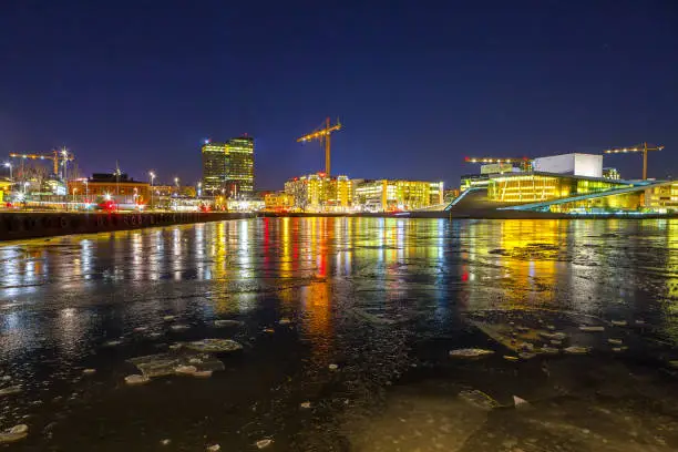 Photo of OSLO. NORWAY - 27 FEB 2016: Night winter view of The Oslo Opera House and Bjorvika
