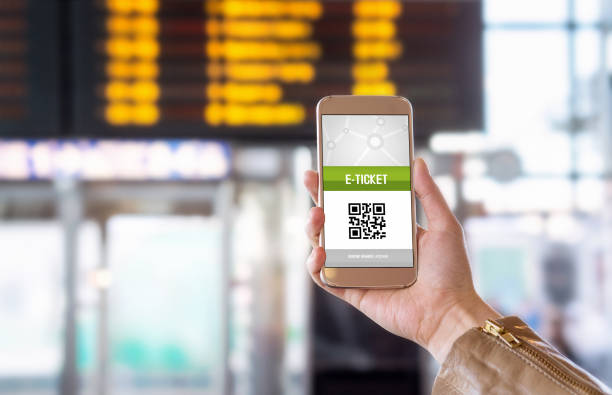 istock E-ticket on smartphone screen with timetable in the blurred background. Buying online ticket from internet. Universal public transportation terminal. Bus, train, metro, subway or underground station 679923874