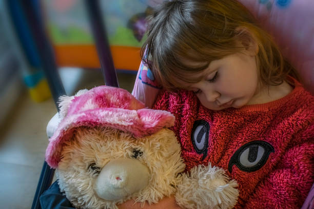 istock Sleeping baby girl with blond hair 679936292