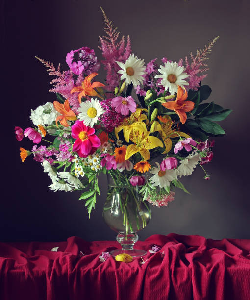 istock Still life with a bouquet in a transparent vase. 679939632