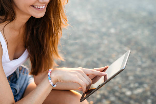istock Woman looking at digital tablet 679939670