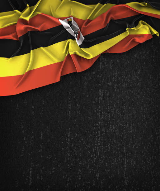 istock Uganda Flag Vintage on a Grunge Black Chalkboard With Space For Text 679940800