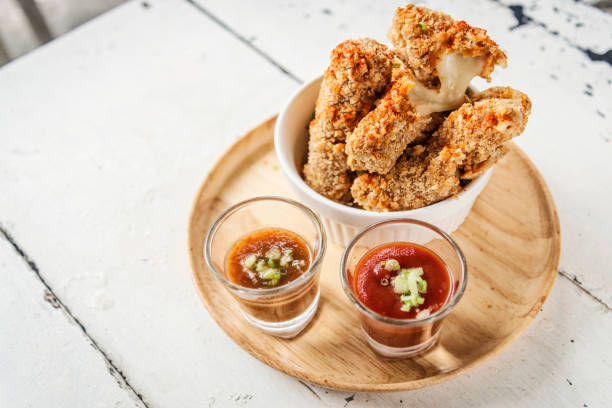 istock breaded mozzarella cheese stick finger bites snack food with salsa dips 679947906