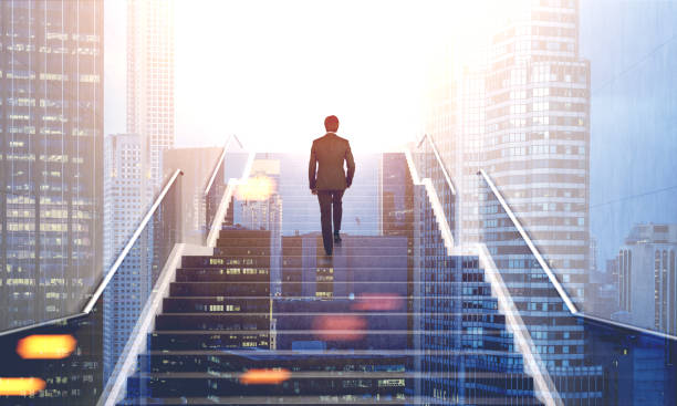 istock Man on stairs, sunny city 679953464