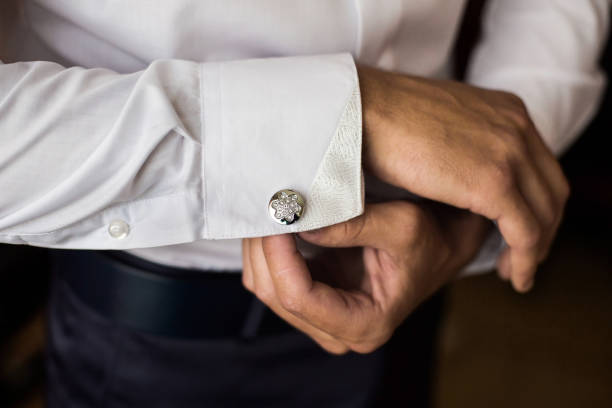 men wear a shirt and cufflinks, correct clothes, dressing - chain smoking imagens e fotografias de stock