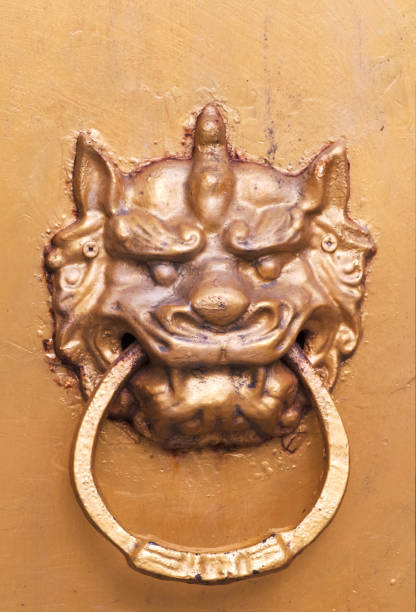 istock Chinese golden colored door knocker 679990352