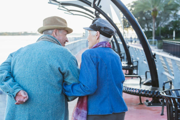istock Happy senior couple outdoors on city waterfront 679991100