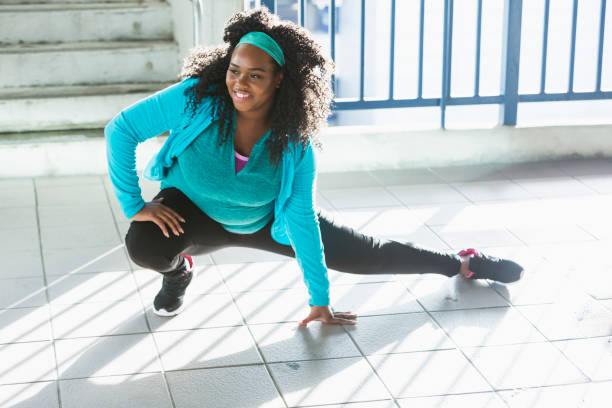 istock Confident young black woman exercising 679993646
