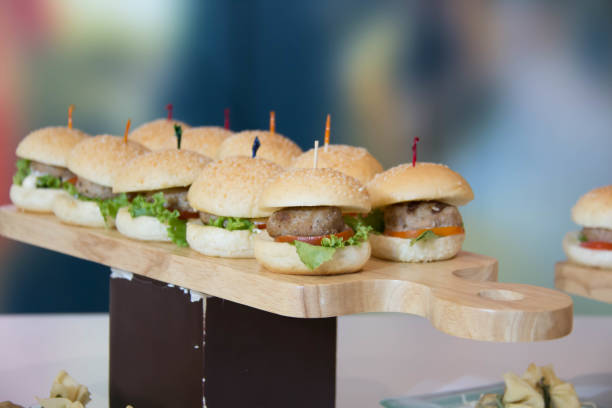 istock Cheeseburger Sliders with Lettuce Tomato 679993812